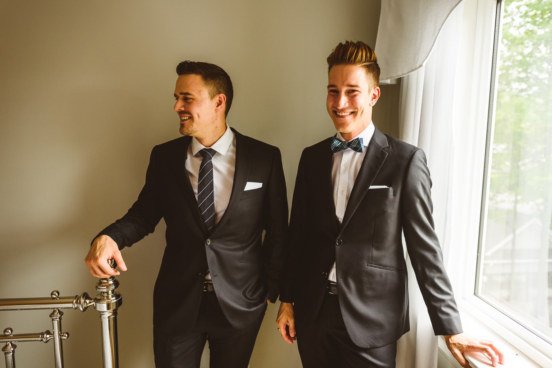 Men watching bride get ready