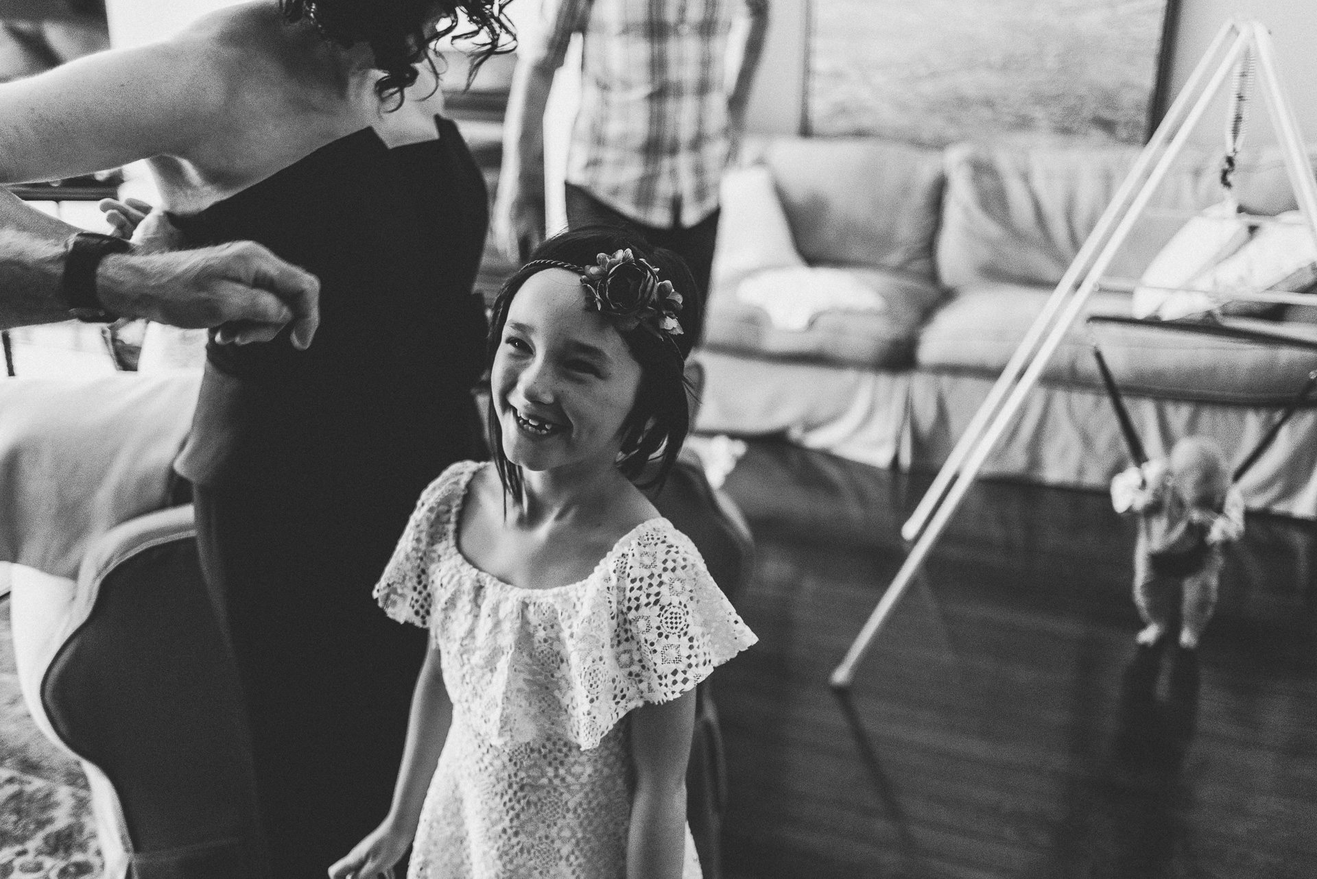 Child laughing at wedding
