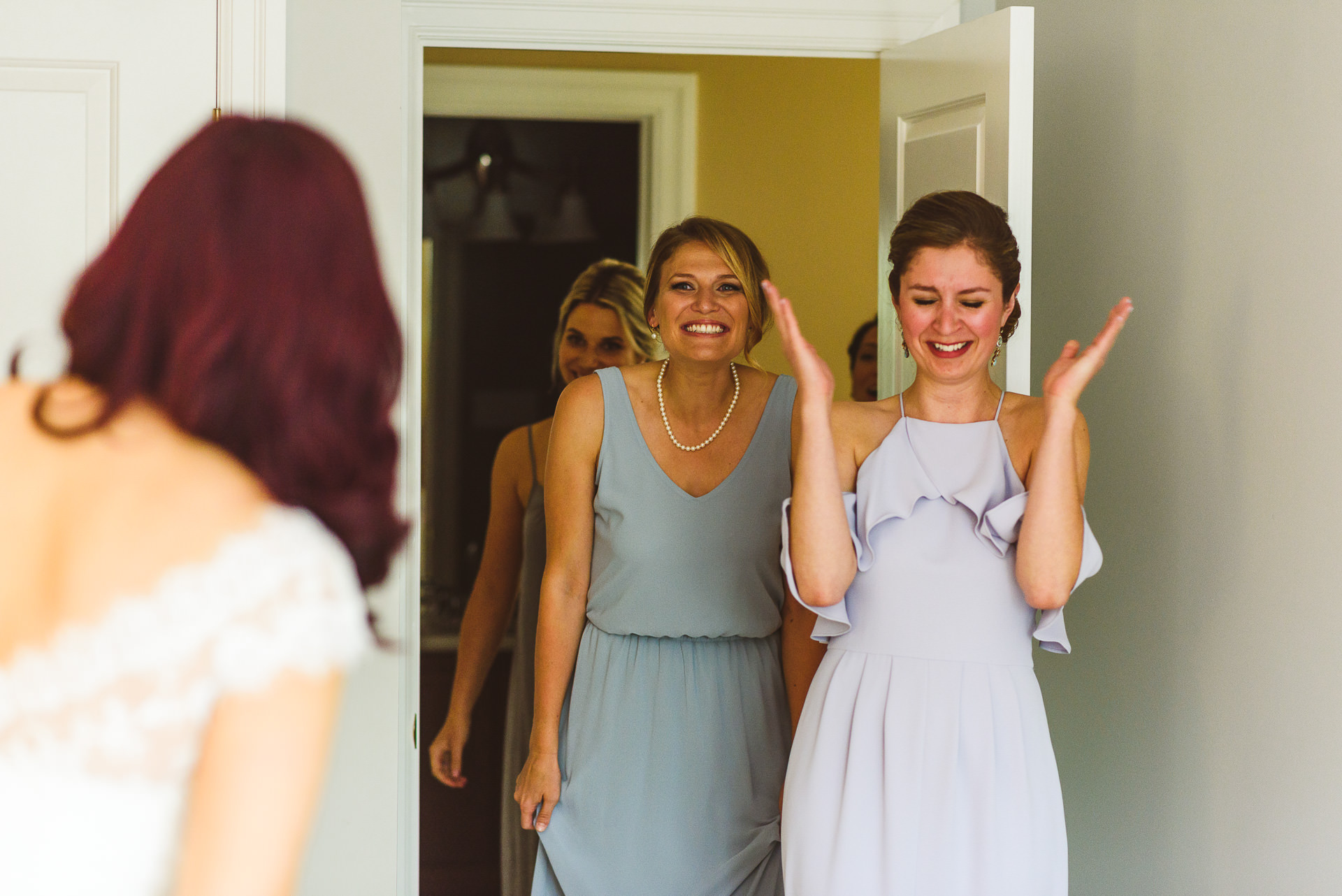 Bridesmaids seeing bride