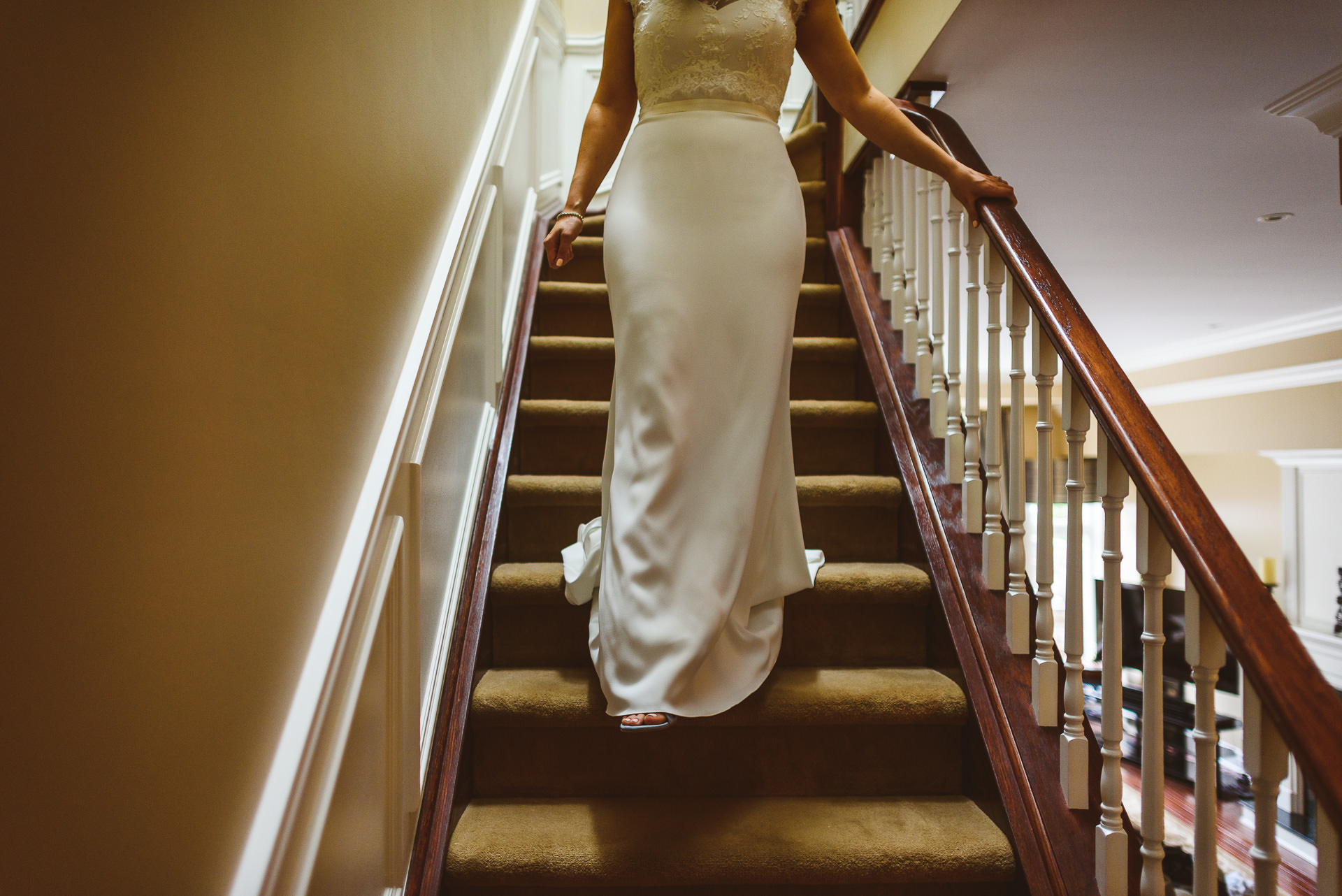 Bride walking down stairs
