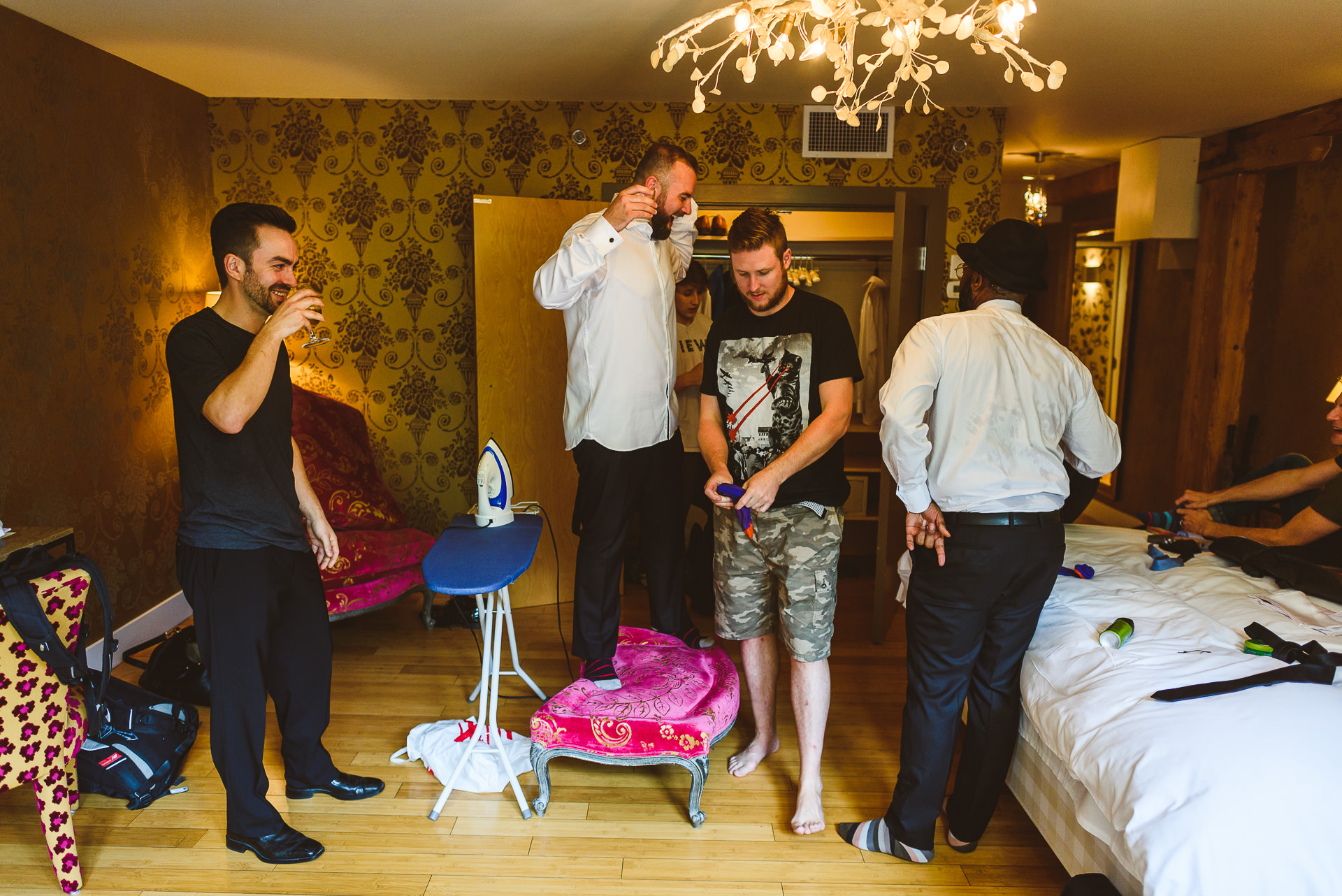 groom getting ready at the ivy