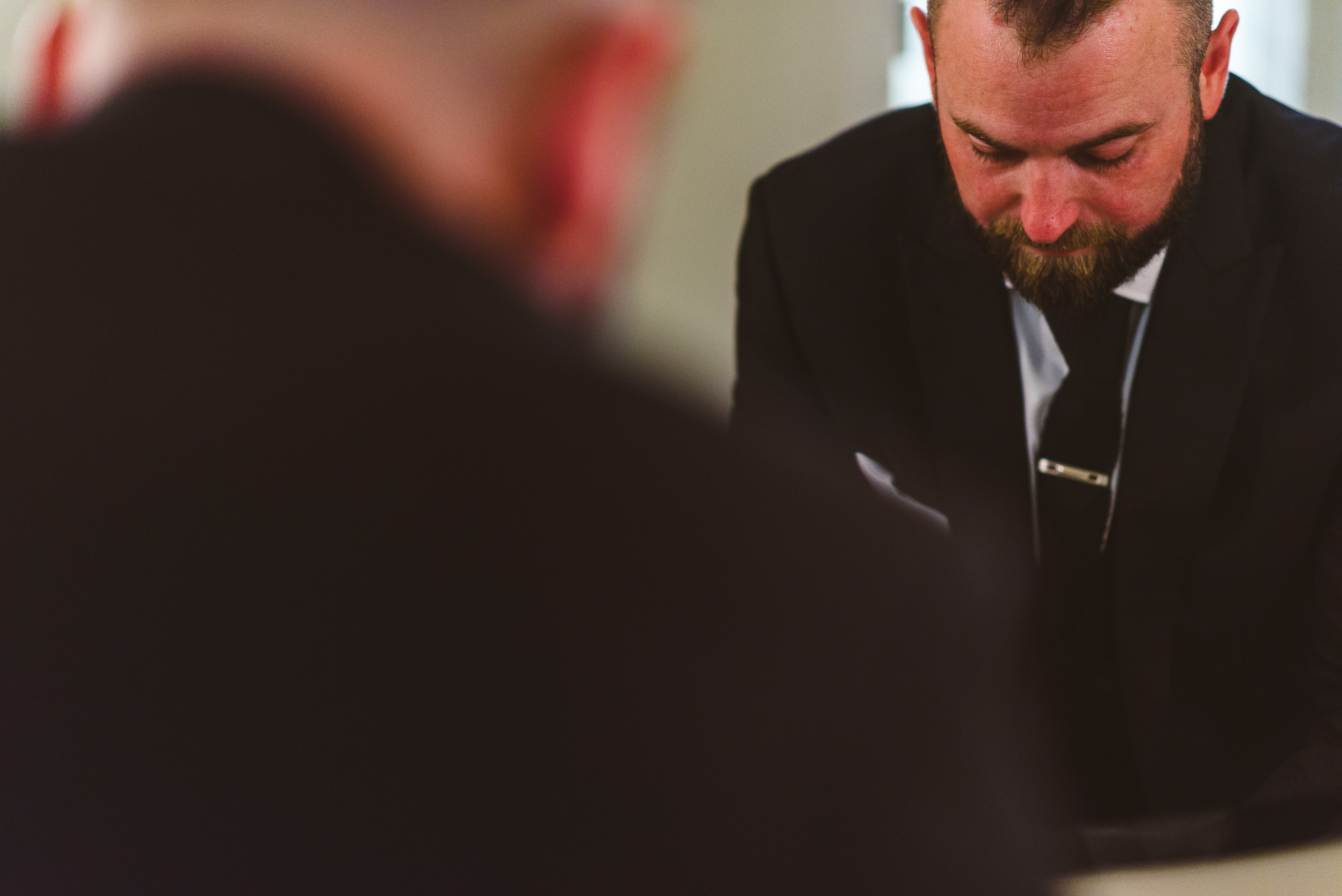 Groom preparing at The Ivy